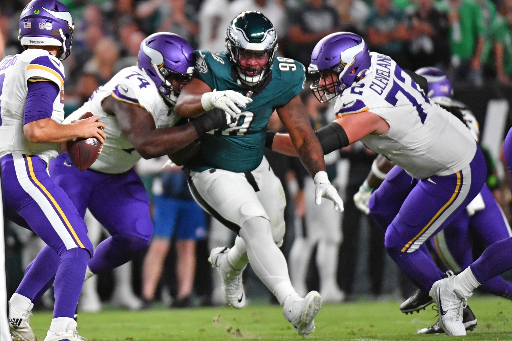 Philadelphia Eagles defensive tackle Jalen Carter (98) is blocked by Minnesota Vikings offensive tackle Olisaemeka Udoh (74) and guard Ezra Cleveland (72). Mandatory Credit: Eric Hartline-USA TODAY Sports